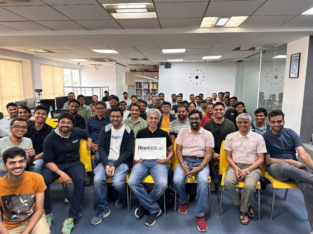 mitramandal.ai Episode 2 group photo – attendees with मित्रमंडळ.ai sign, Feb 21, 2026